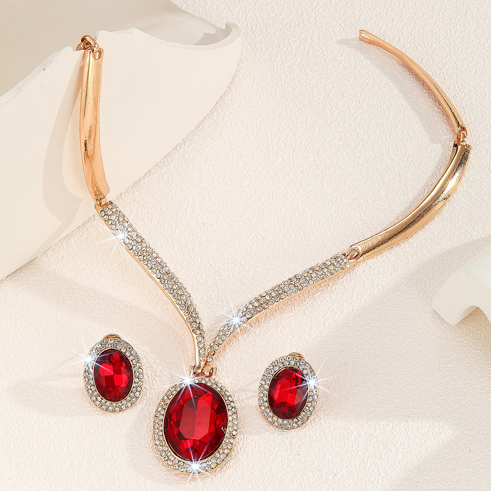 Conjunto de Colar e Brincos de Cristal Vermelho com Strass Branco Incrustado em Liga de Ouro e Zinco